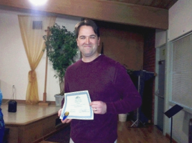 Darrell W. Vance of the US Forest Service holding certificate of appreciation given him by Arcadia Historical Society for his January 31 presentation: "Stories the San Gabriels Tell". 