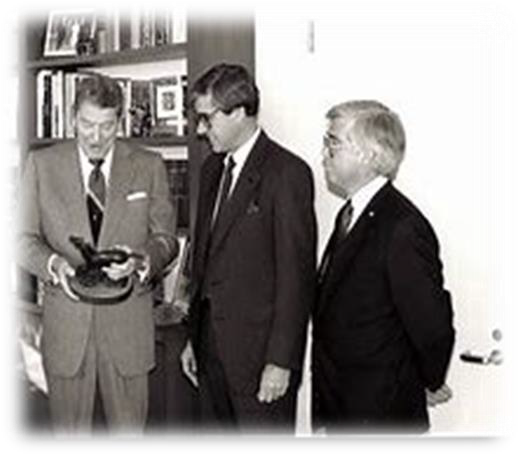 Jim with President Ronald Reagan in black and white