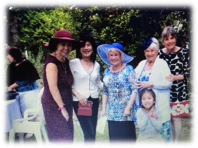 Group of ladies wearing tea hats