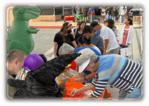 Volunteers giving away candy and the Halloween event in Downtown Arcadia.